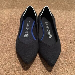 Rothy’s pointy flat. Size 7. Black with white piping